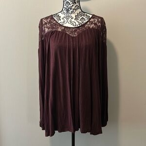 NWOT.  Woman’s round neck long sleeve blouse with lace neckline in burgundy.